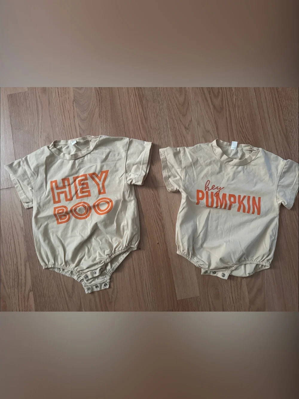 Neutral Beige Kids Bodysuit with Orange Graphic